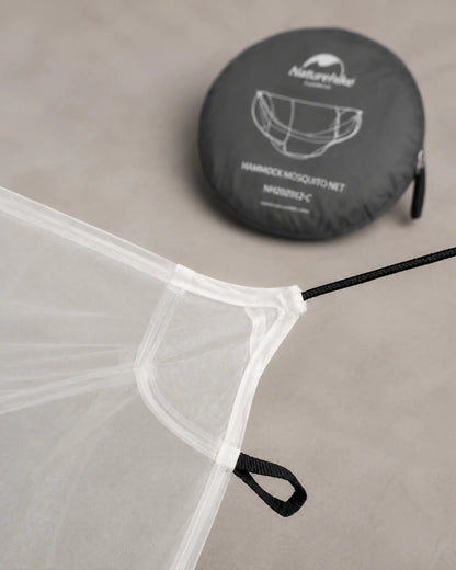 Close-up of reinforced corner, attachment loop and mesh on the white mosquito net