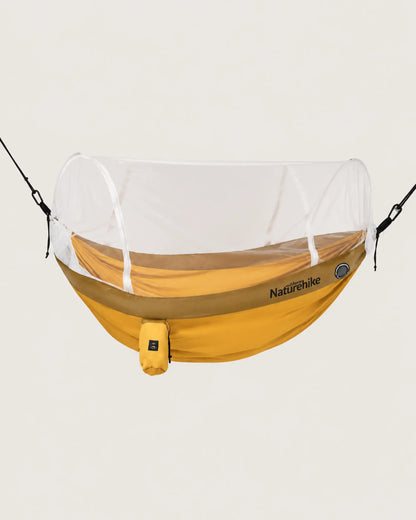 Yellow double camping hammock with white tunnel mosquito net deployed