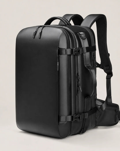 Close view of the black business travel backpack compression buckles and zipper hardware