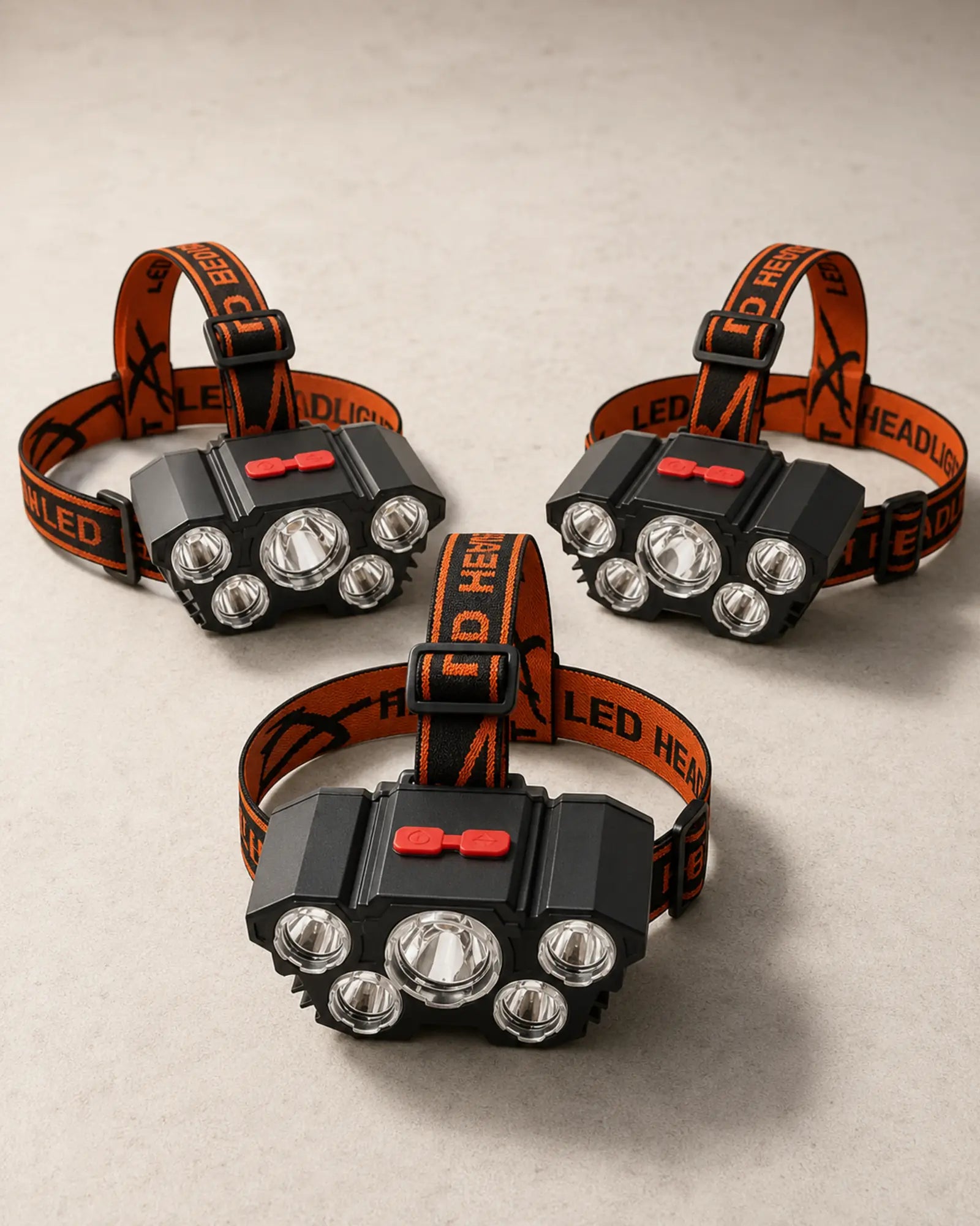 Three T21 Style A rechargeable headlamps with matching orange adjustable straps