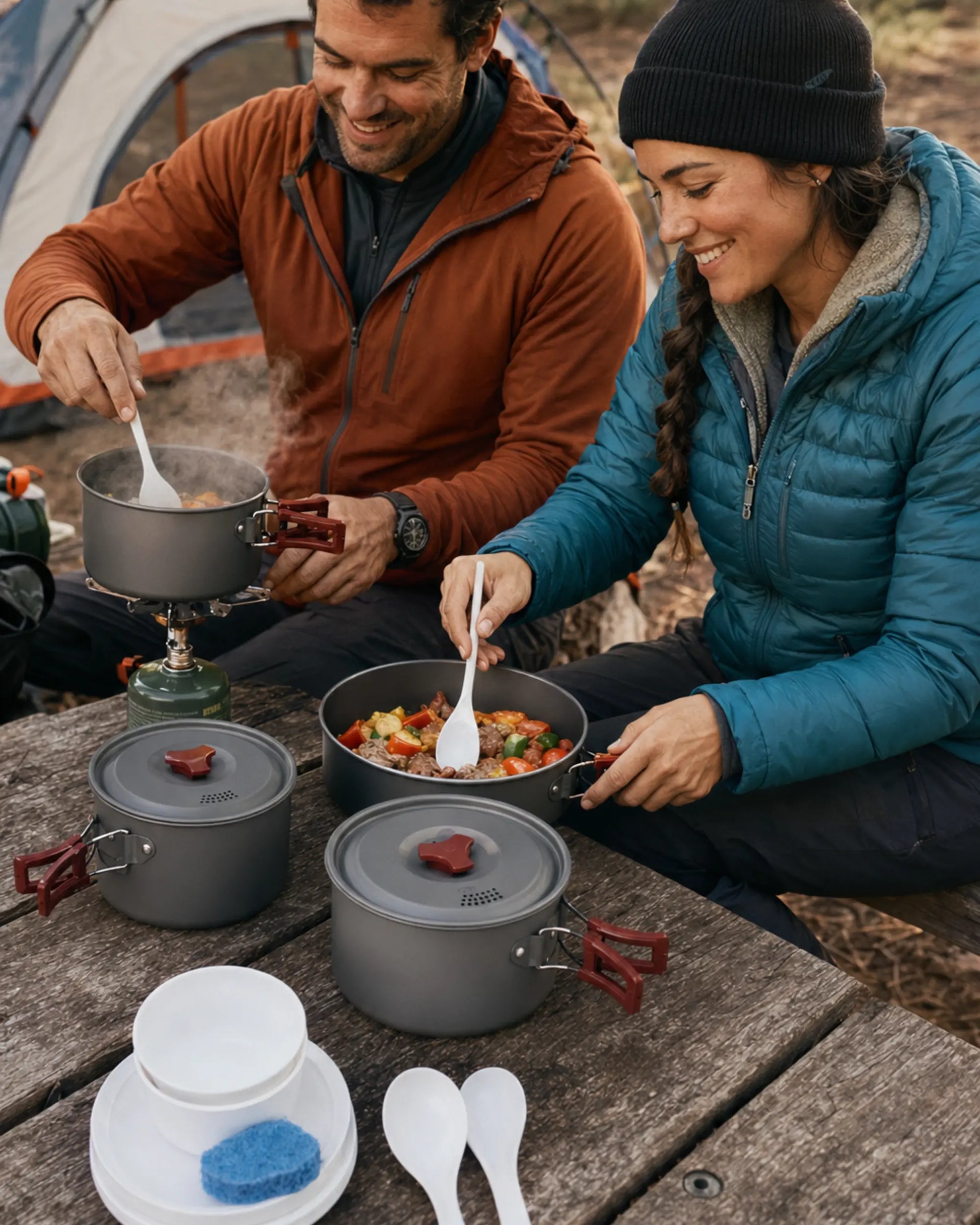 Two campers cooking with Fire-Maple package 206 three-pot cookware set