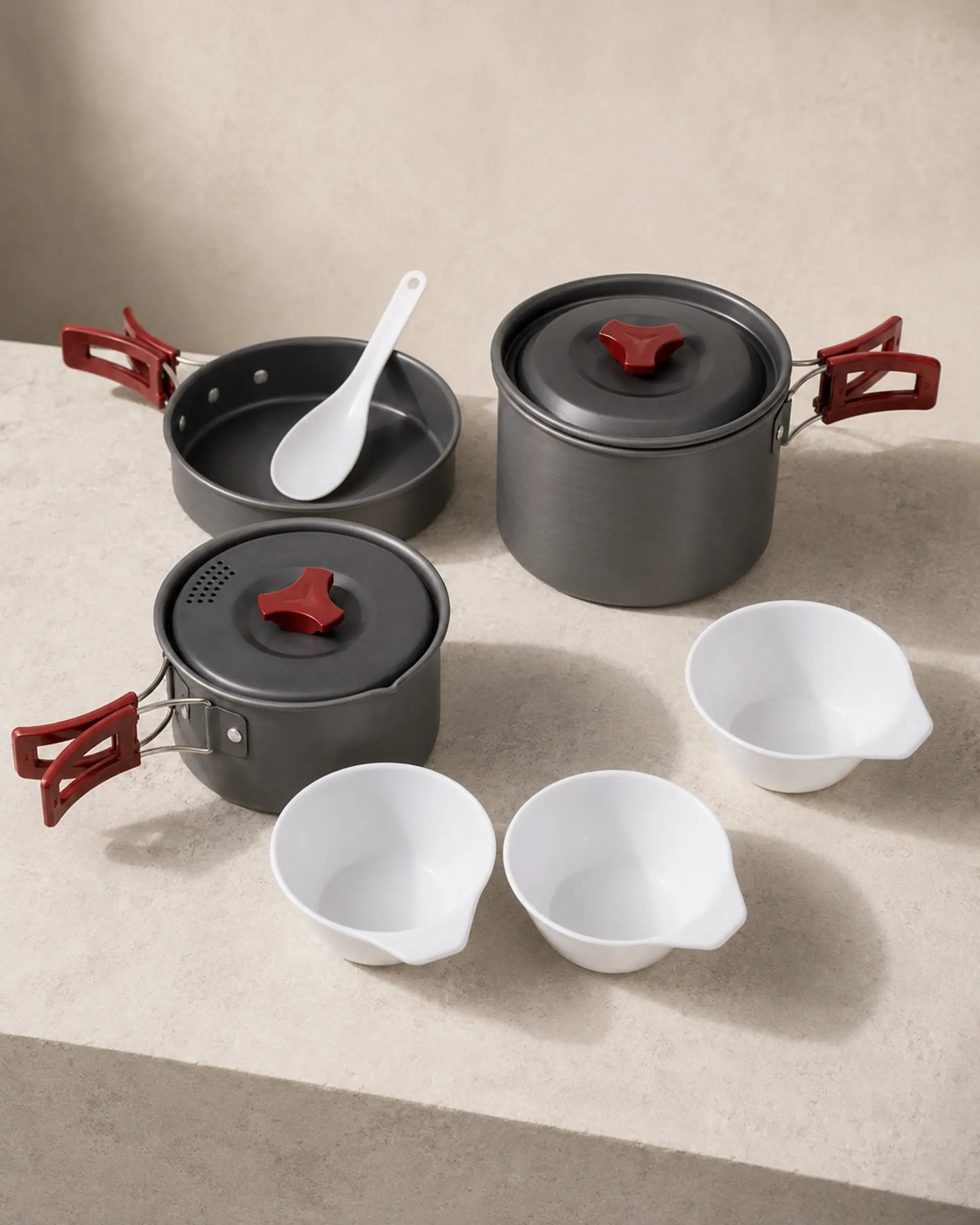 Editorial studio arrangement of Fire-Maple package 202 hard-anodized cookware
