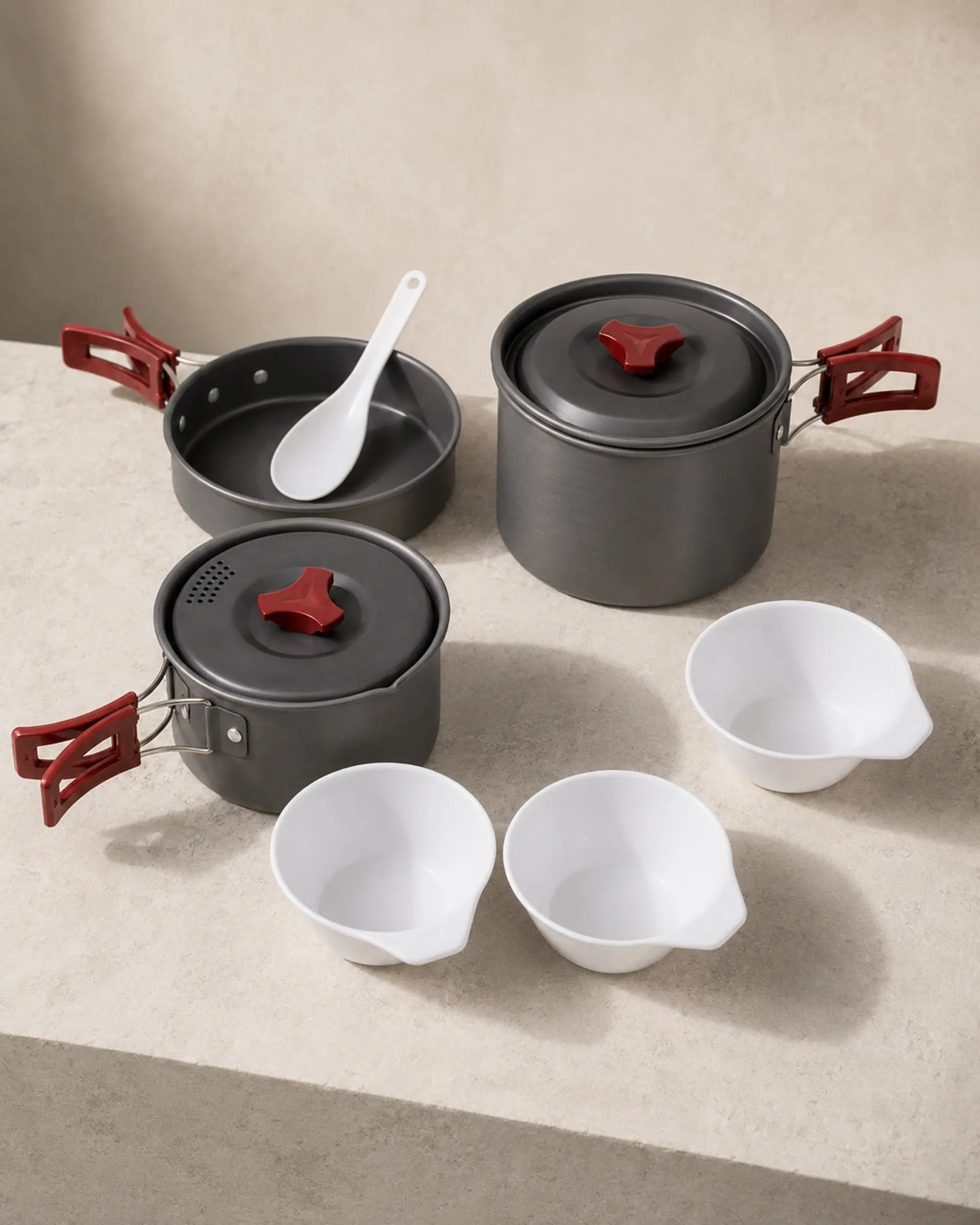 Editorial studio arrangement of Fire-Maple package 202 hard-anodized cookware