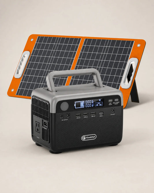 FlashFish portable power station and orange solar panel kit on warm stone