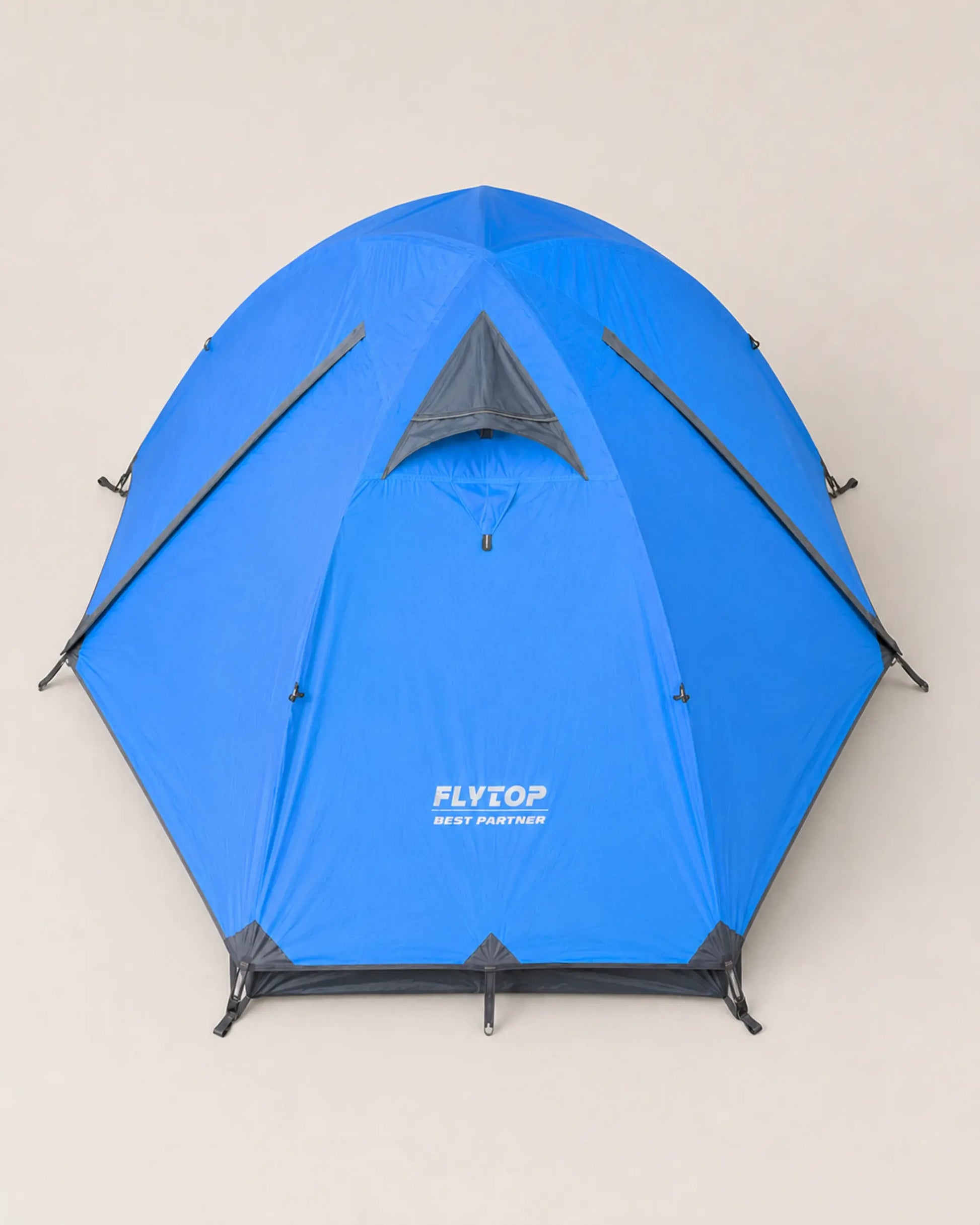 Elevated top view of FLYTOP blue waterproof camping tent and ventilation panel
