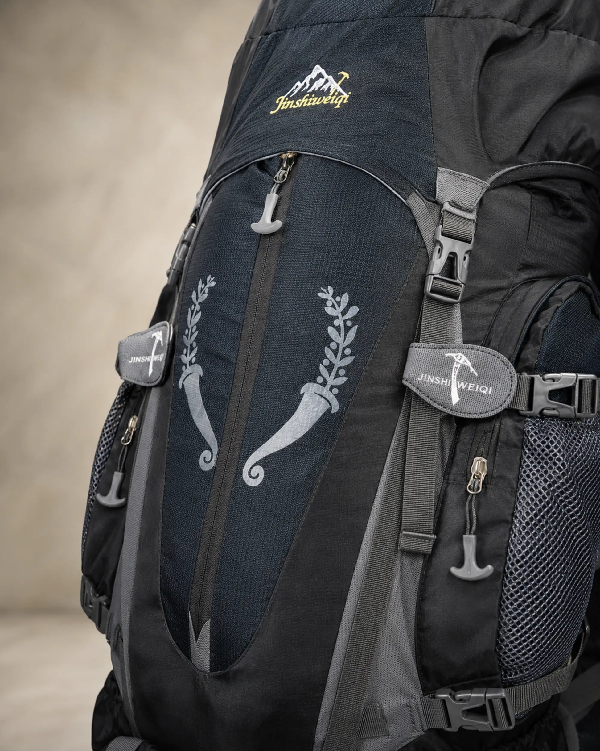 Black Jinshiweiqi hiking backpack fabric zipper buckle and mesh pocket detail