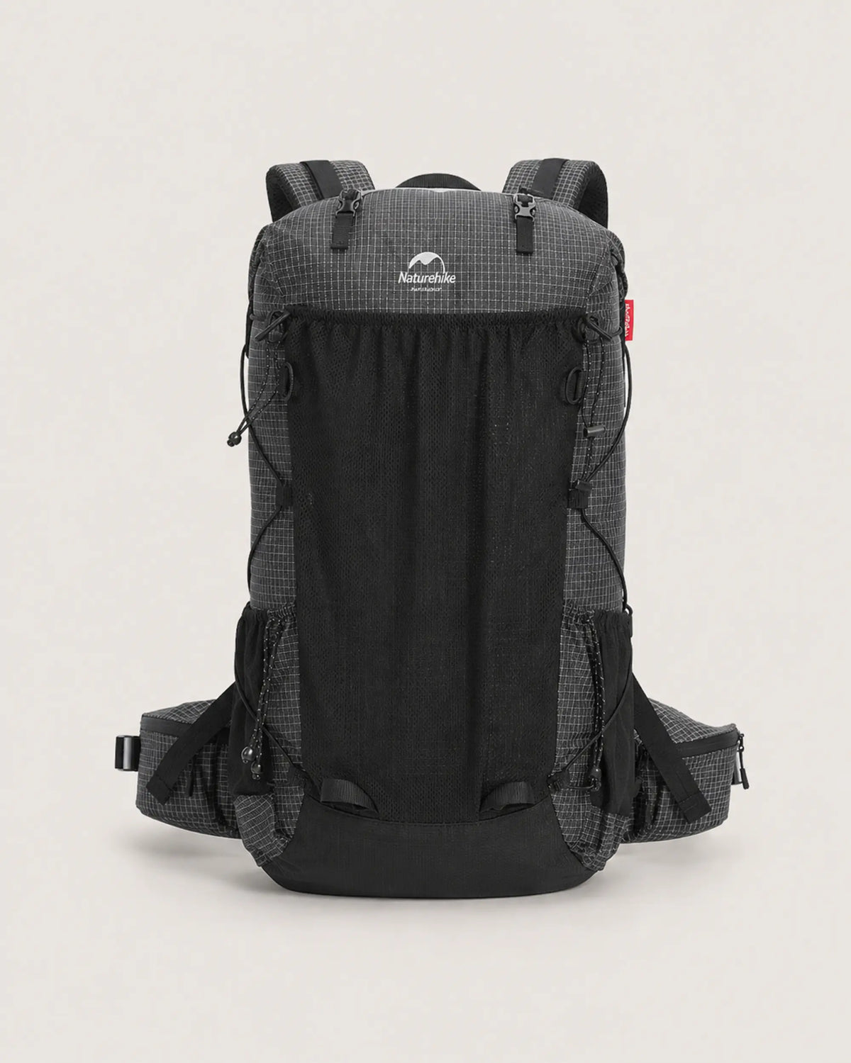Naturehike 40L Black hiking backpack front view on warm grey