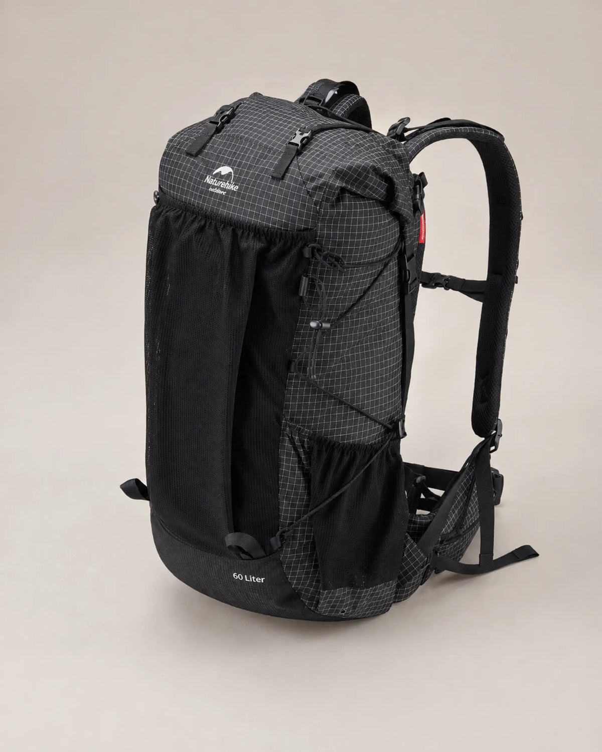 Naturehike 60L Upgraded Black backpack elevated view showing roll-top construction