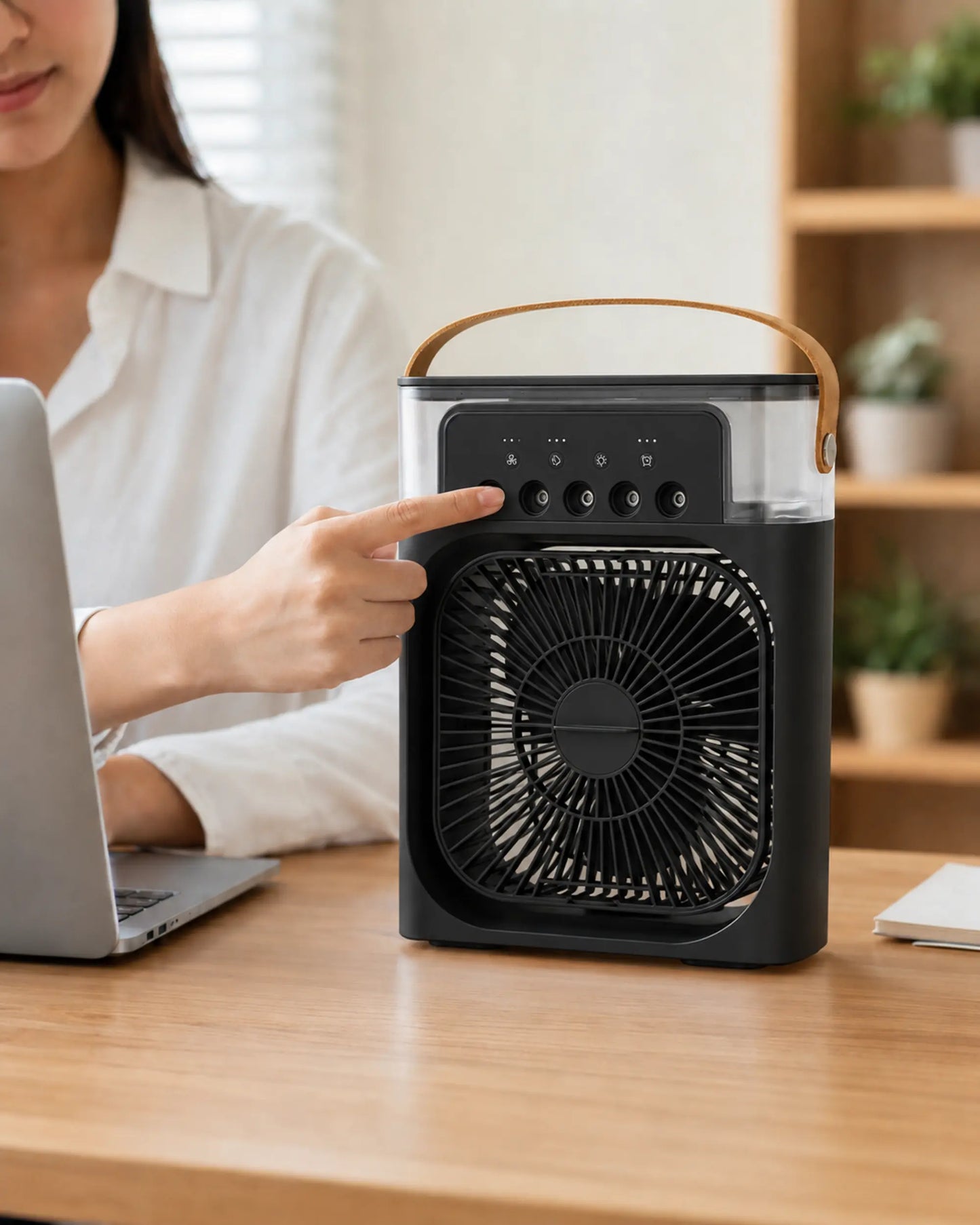 OIMG black portable USB mist fan used on a home office desk