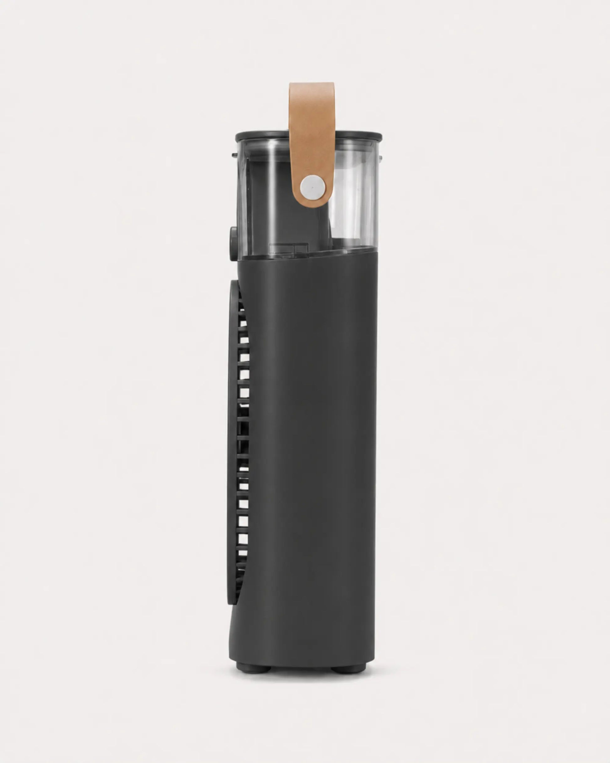 Side profile of OIMG black portable desktop mist fan with clear water tank