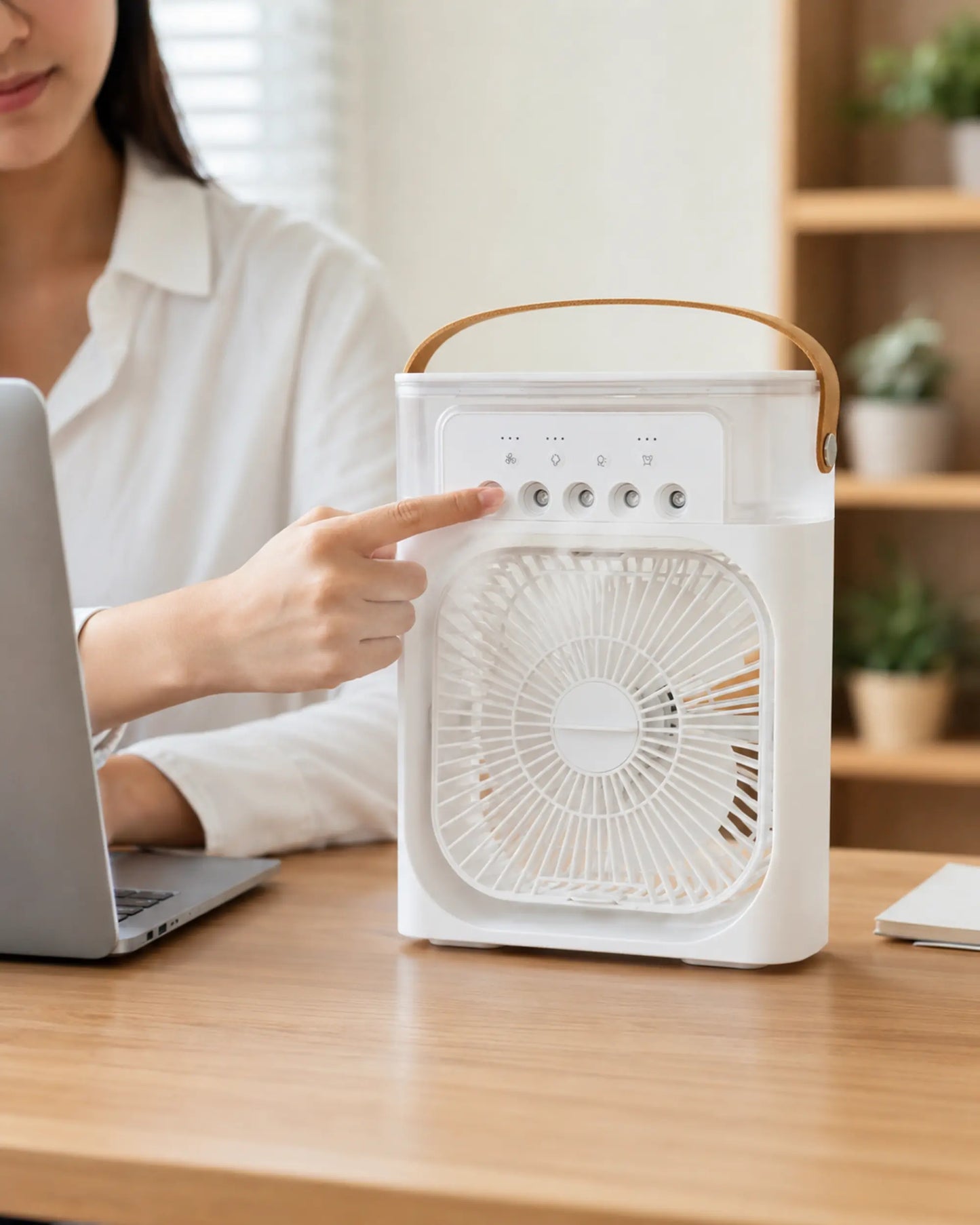 OIMG white portable USB mist fan used on a home office desk