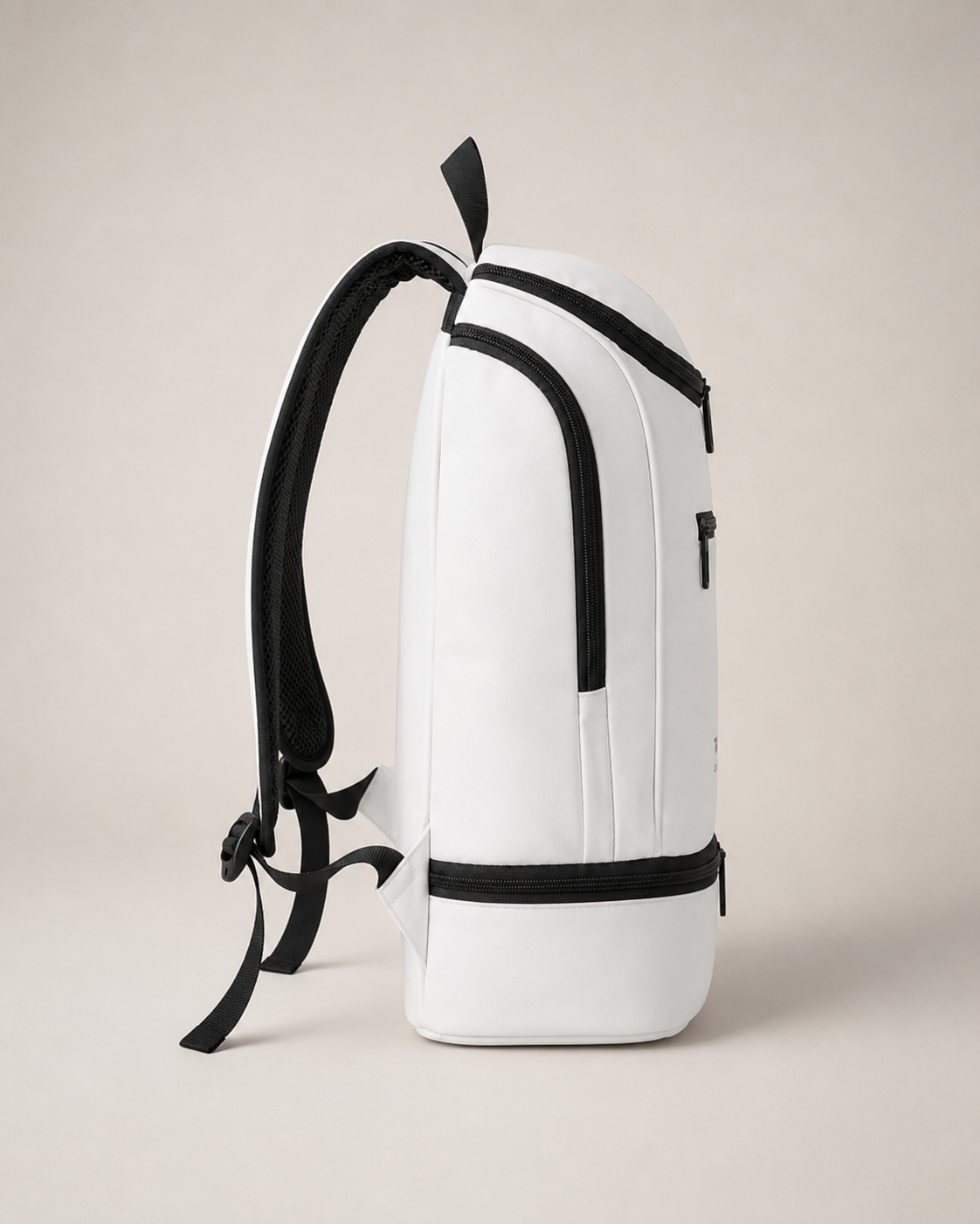 Scione backpack side profile showing pack depth and shoe compartment outline
